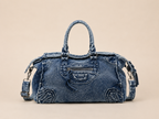 The Washed Denim Moto Satchel