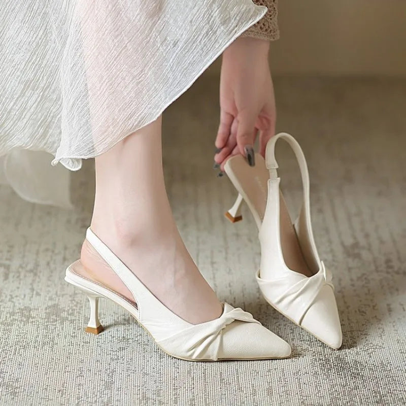 Knot Your Average Twist Bow Slingback Kitten Heels