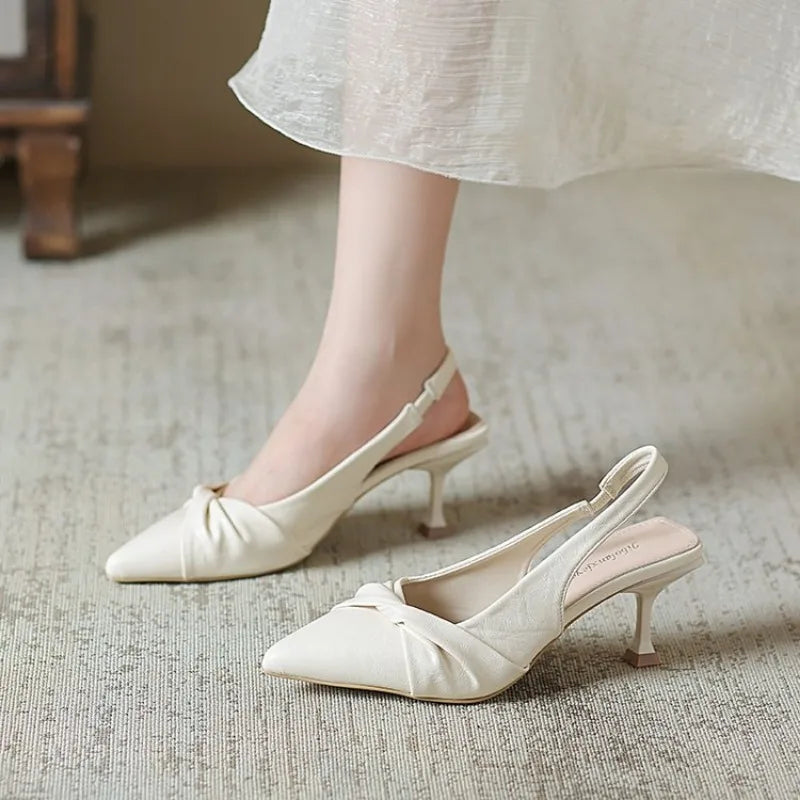 Knot Your Average Twist Bow Slingback Kitten Heels