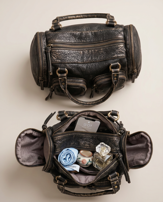 Corinne Tassel Zip Satchel