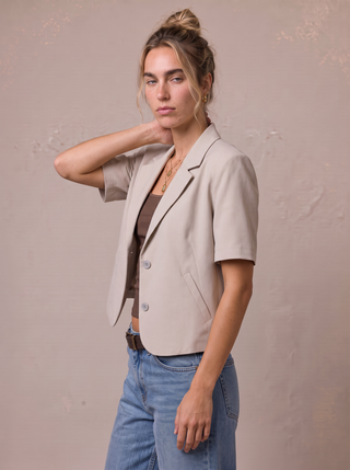 Emberly Cropped Short-Sleeve Blazer in Oatmeal, three-quarter view