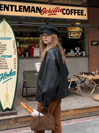 Lennon Oversized Faux Leather Jacket in Black, three-quarter view