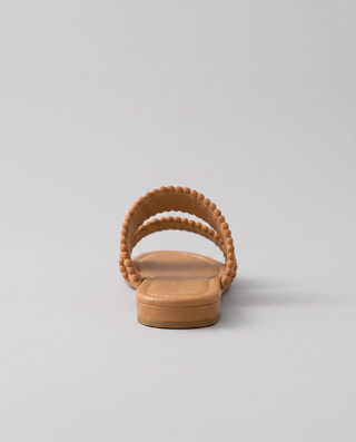 Palmyra Cruz Woven Raffia Slides