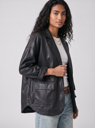 Pixie Cocoon Faux Leather Jacket in Black, three-quarter view