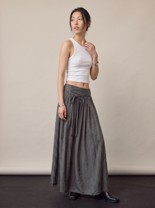 Rowena Low-Rise Drawstring Maxi Skirt in Charcoal, three-quarter view